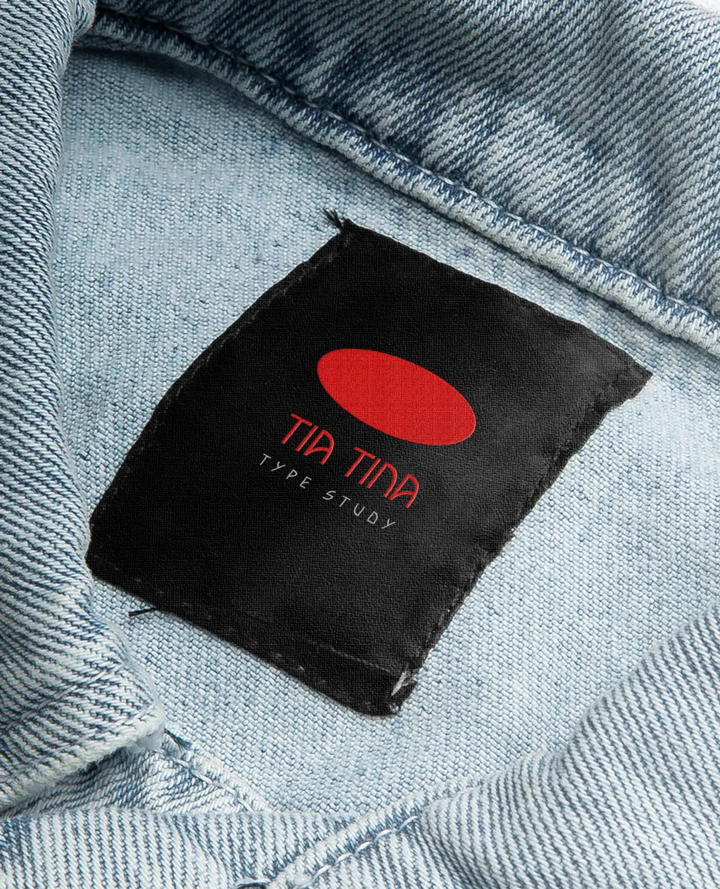 The Tia Tina label stitched inside the collar of a denim jacket
