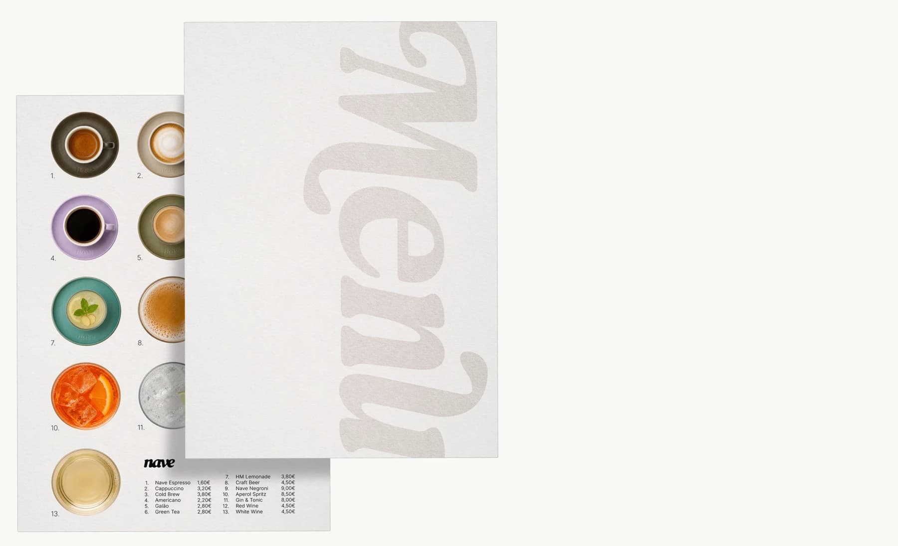 The two menu sheets overlapping, lying on bare paper