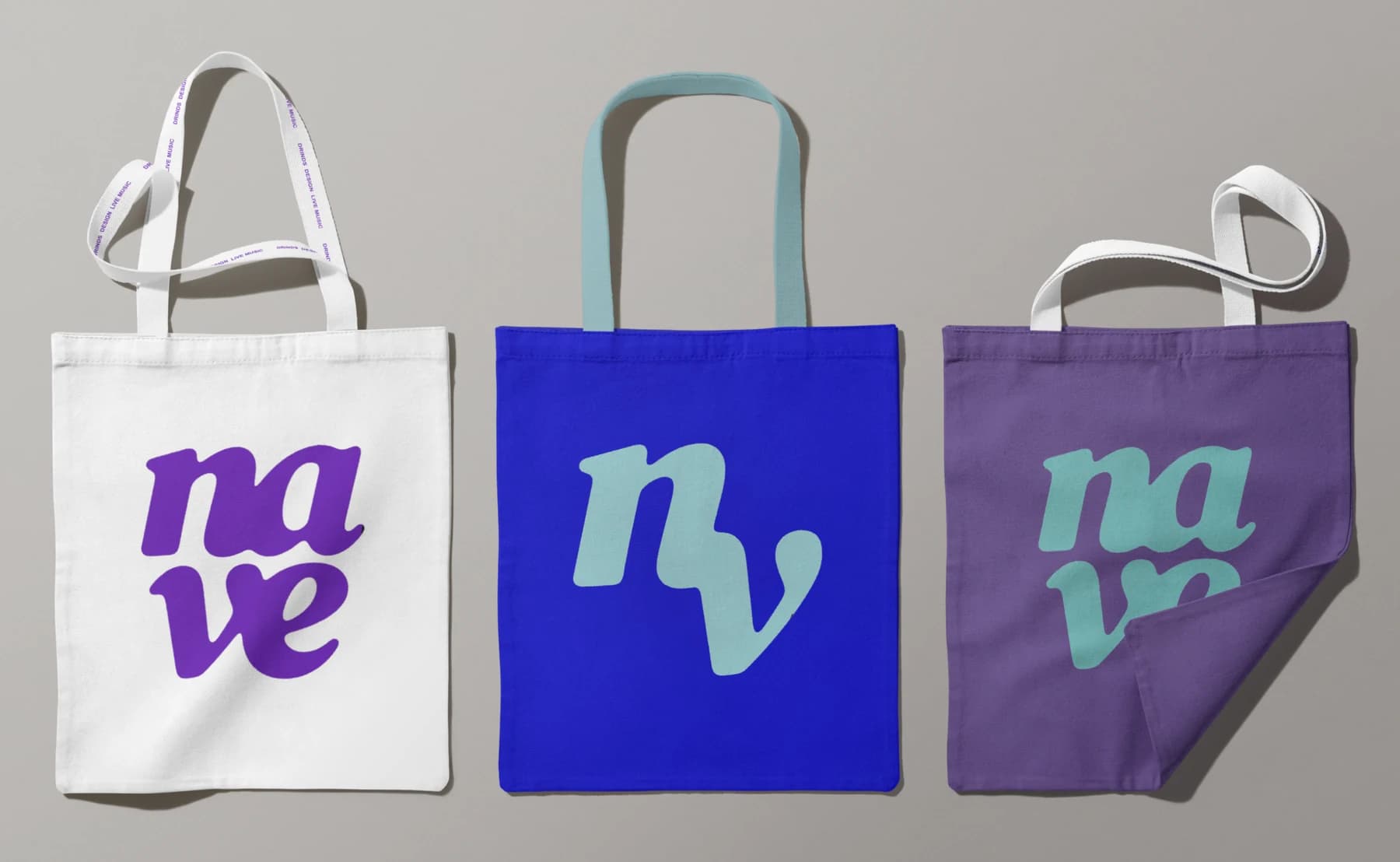 Three totes - white, blue and purple - each carrying the mark