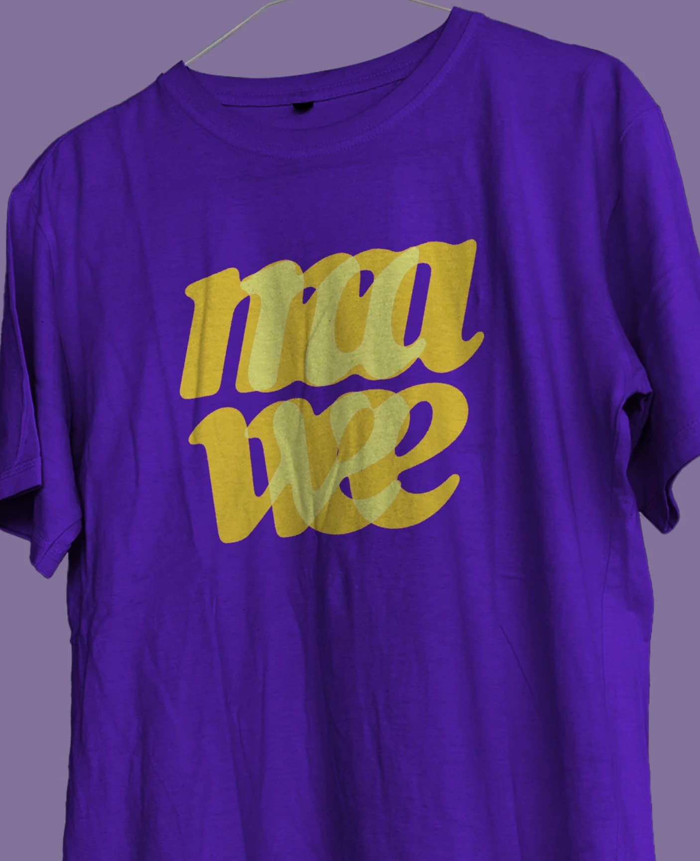 A purple t-shirt printed with the logotype in yellow